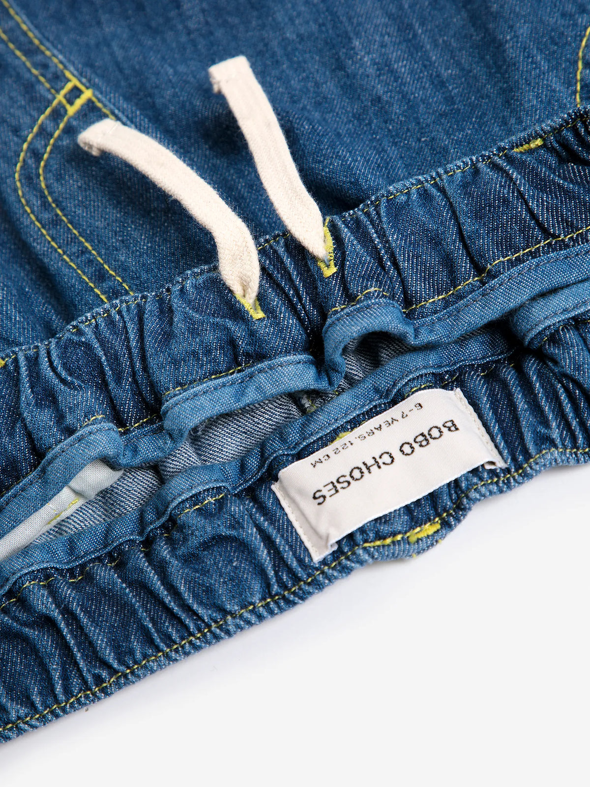 TAXI SAURUS TAG DENIM PANTS
