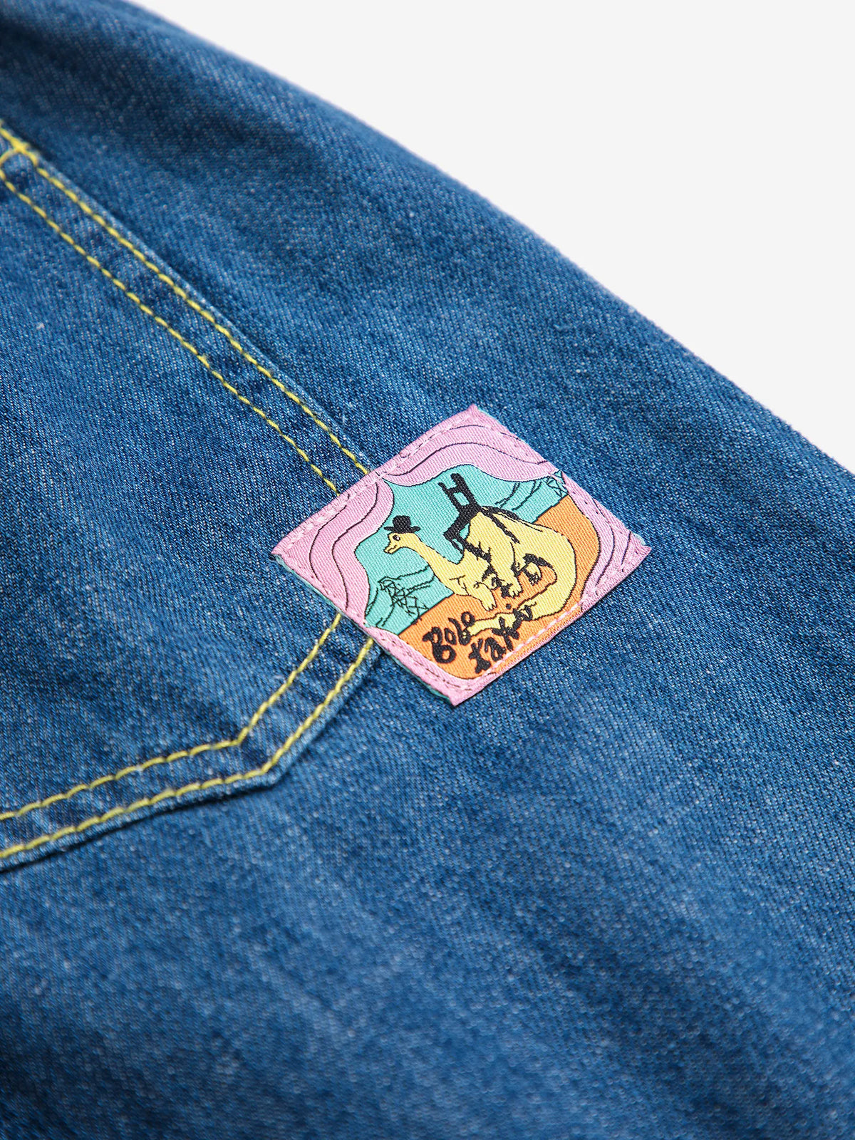 TAXI SAURUS TAG DENIM PANTS