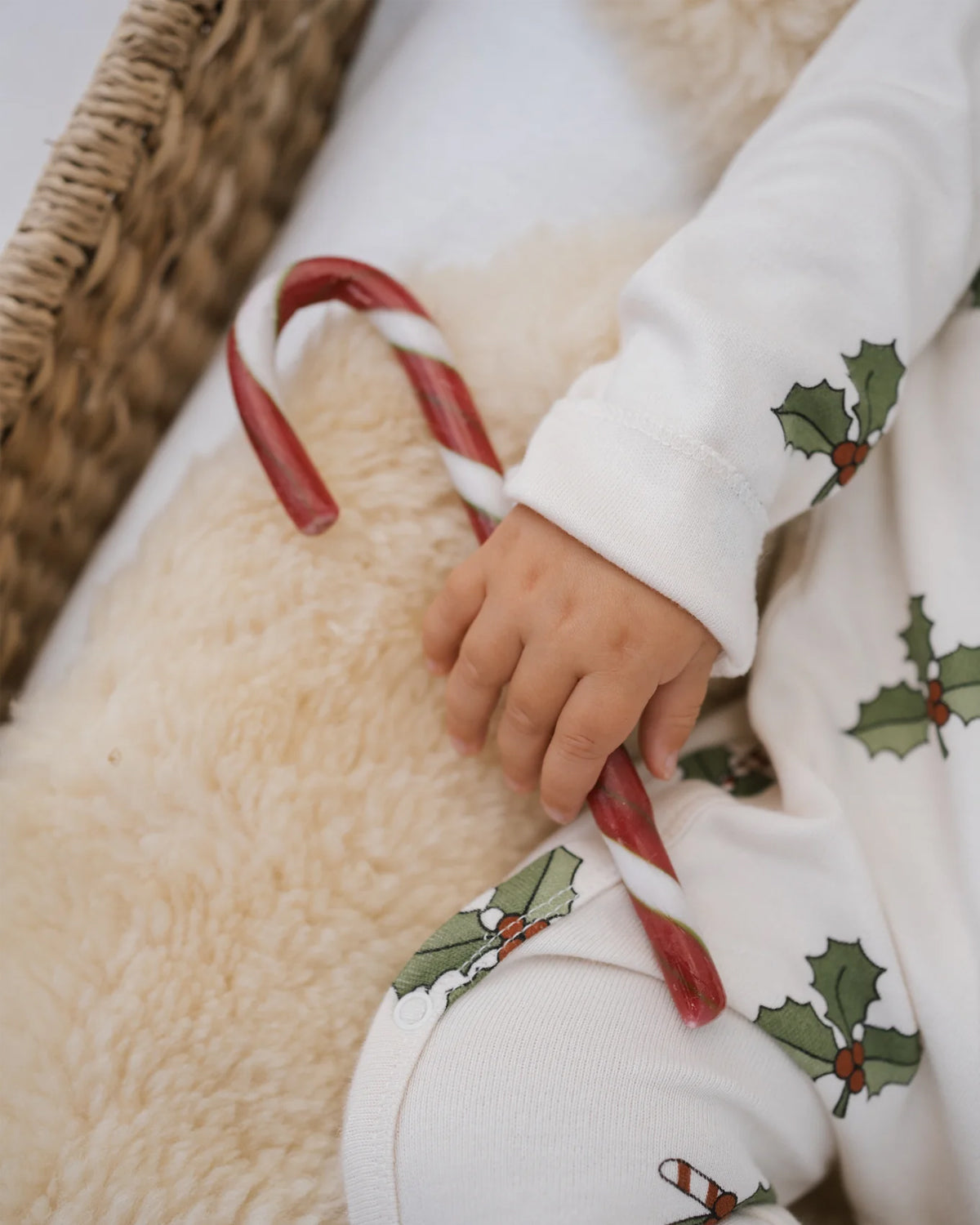 CHRISTMAS HOLLY FOOTED SUIT