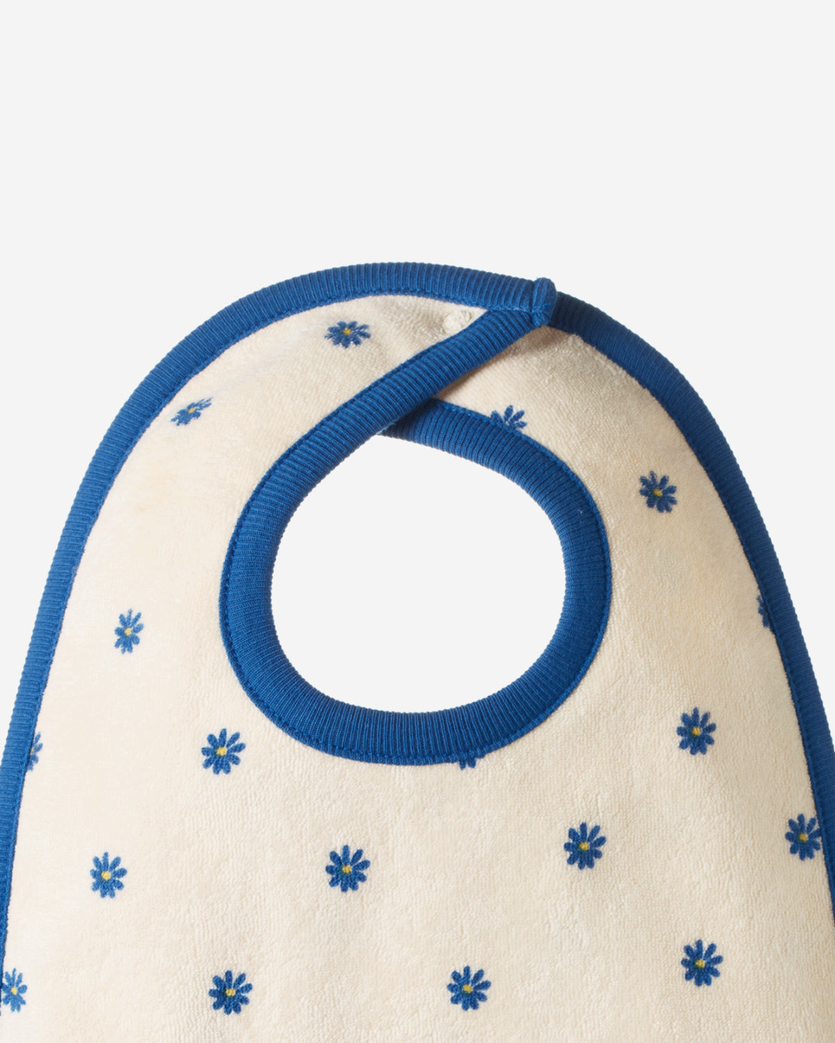 REVERSIBLE BIB - DAISY DAZE BLUE